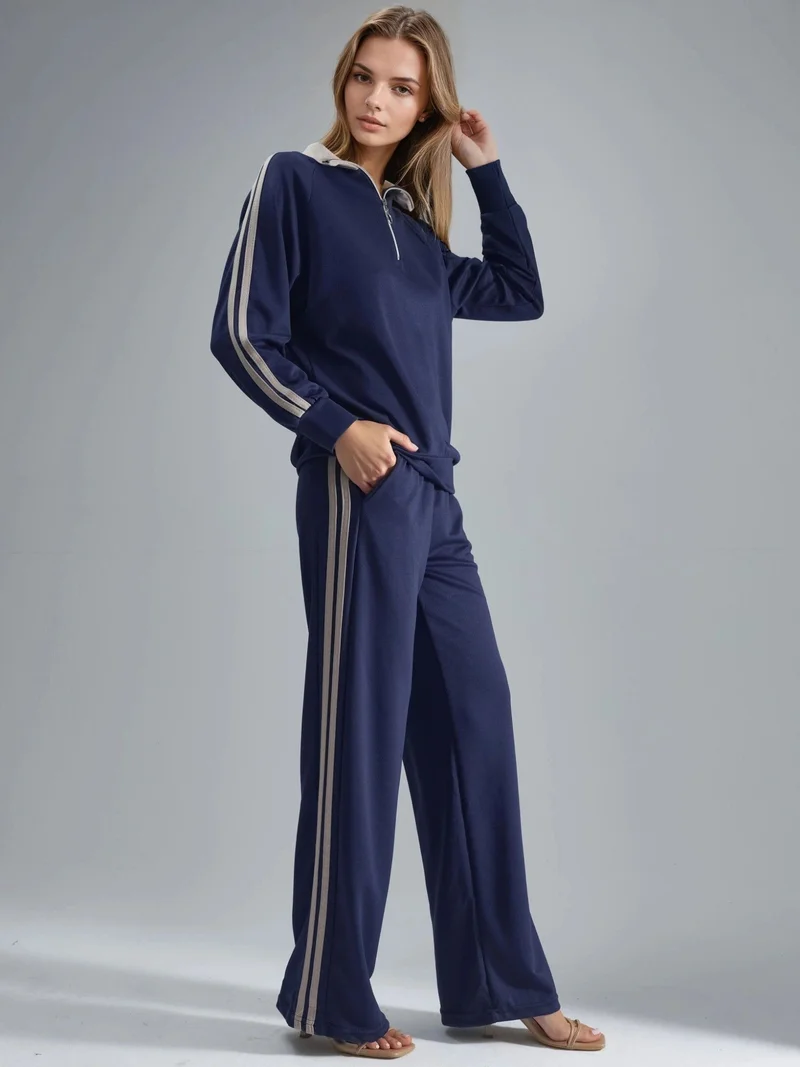 هيكاب طقم نسائي مخطط واسع الأرجل بياقة بسحاب من مجموعة بيرسان